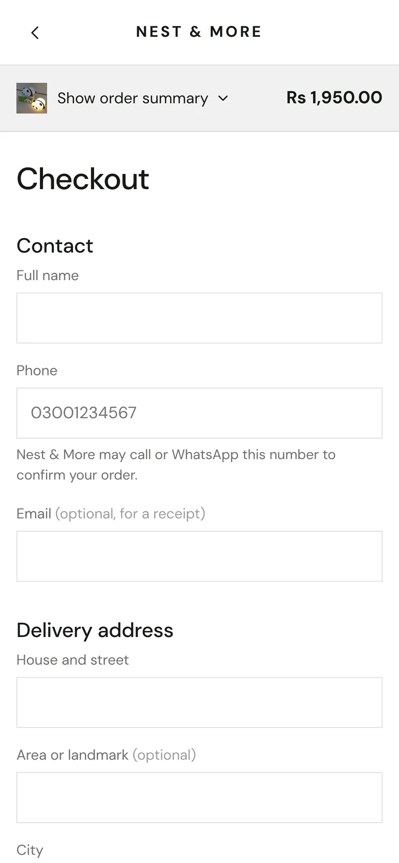 The checkout of Nest & More, an EzVenda demo shop, on a phone: contact, phone number and delivery address
